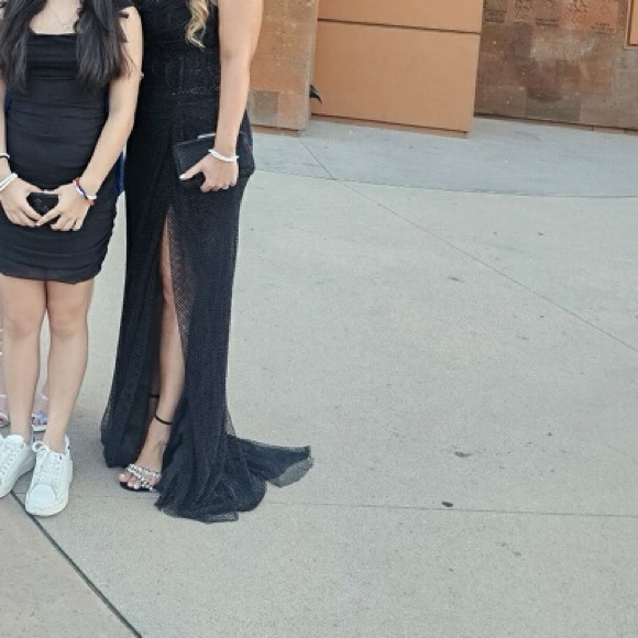 Size 12 catwalk couture . I’m size 8 and the dress fits me perfectly. - Picture 3 of 4